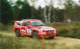 09. Janusz Kulig i Jarosław Baran - Ford Escort WRC.